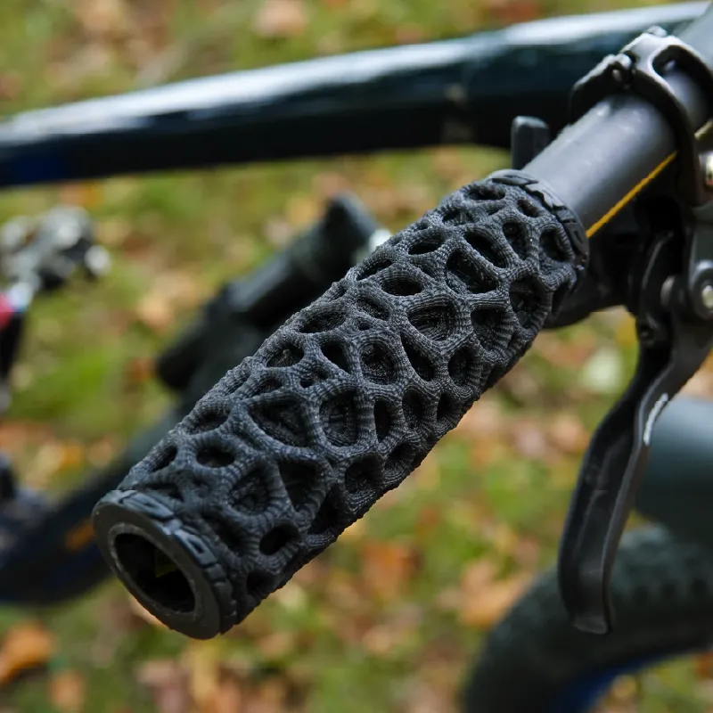 Close view of an ExoGrip installed beside the brake lever on a mountain bike